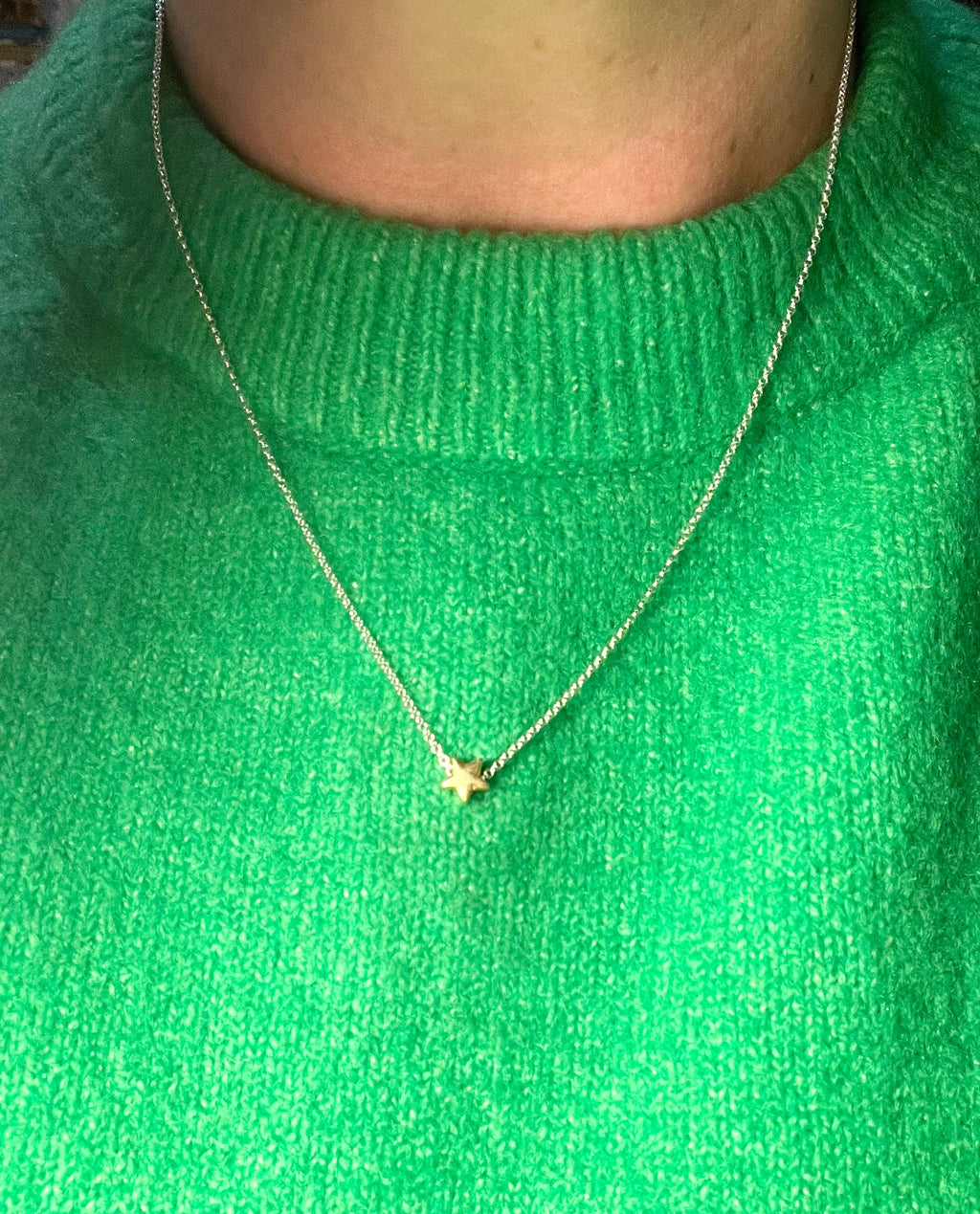 Tiny gold star necklace